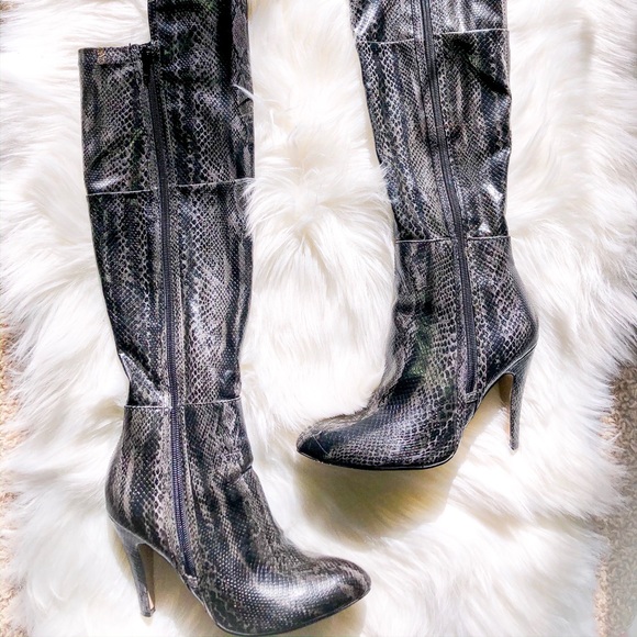 Anastasia snakeskin knee-high boots